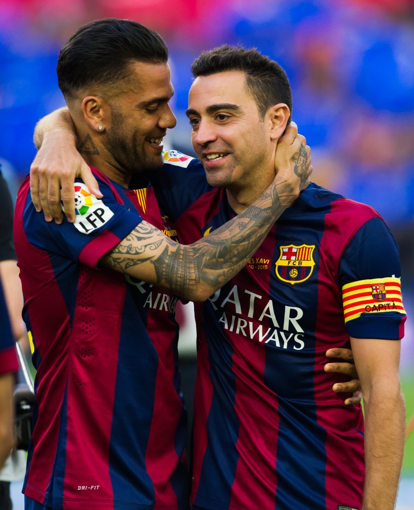 Alves & Xavi (©Gallo Images)